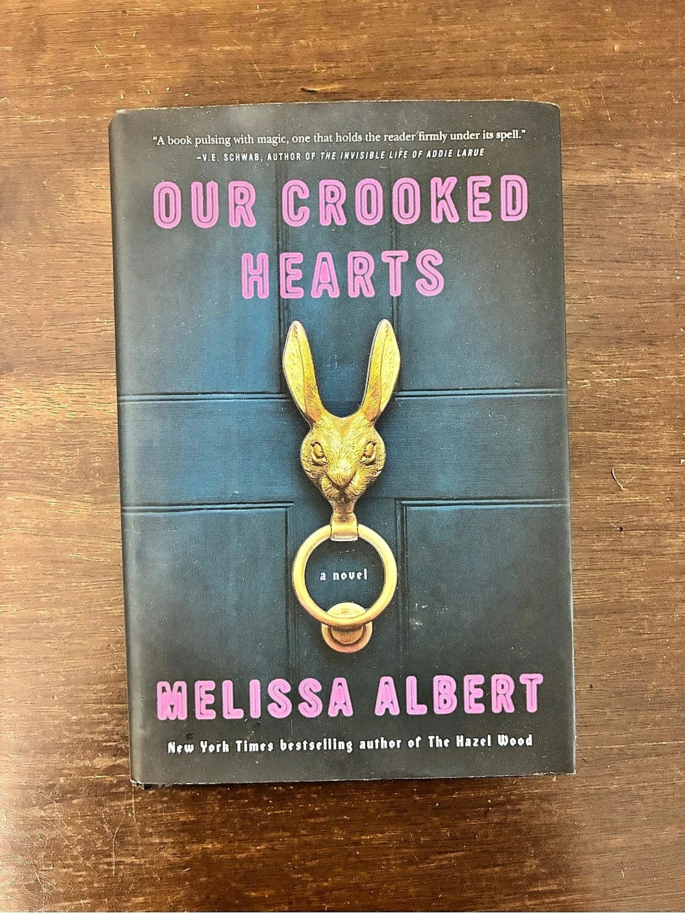 Flatiron Books Our Crooked Hearts Hardcover Novel Black & Pink